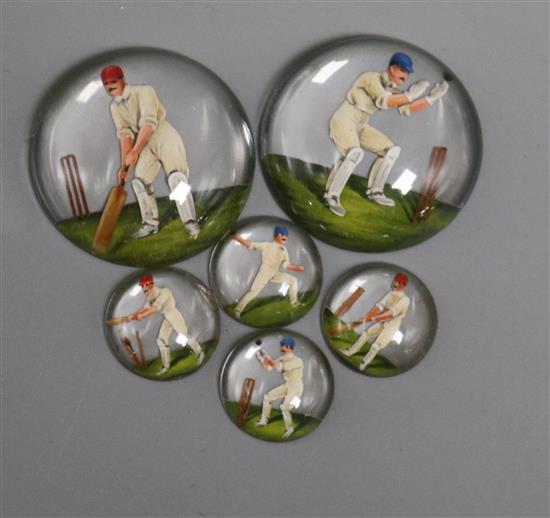 A six piece Essex crystal cricket related unmounted dress stud set, each decorated with a batsman.